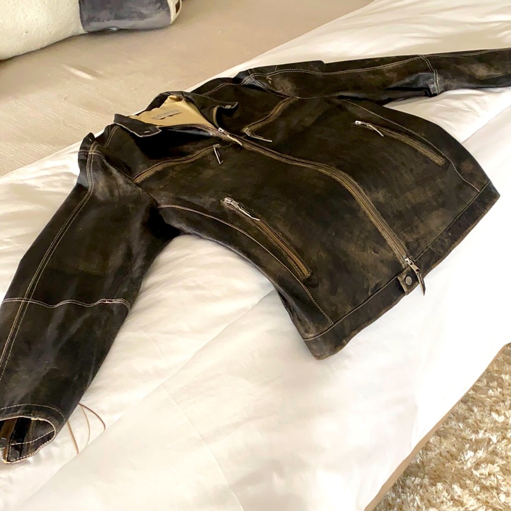 Distressed leather jacket with 2 zippered pockets and sleeves-perfect condition!
